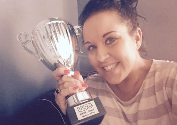 Fallon Buckley from Haywards Heath with her trophy SUS-160818-104851001