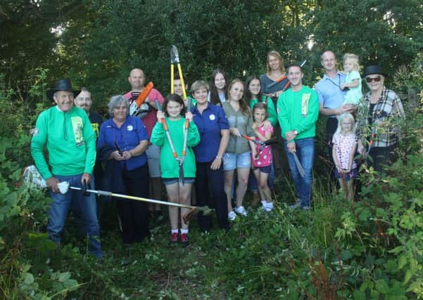 Volunteers from the Friends of Burgess Hill Green Circle Network SUS-160818-114453001