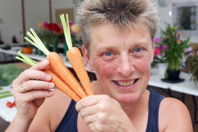 Trophy winner Sheila Shepherd with her carrots DM16135662a