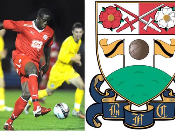 John Akinde and Barnet FC's badge