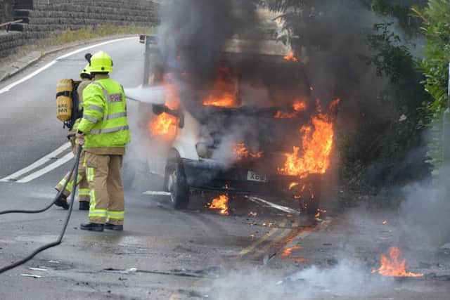 Firefighters tackling van fire in Pulborough. Photo by Jim Varley.