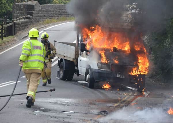 Firefighters tackling van fire in Pulborough. Photo by Jim Varley.