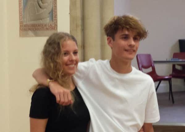 Next year's head boy, Tom Jarman, 17, and head girl, Matilda Fuller, 17, collecting their AS level results