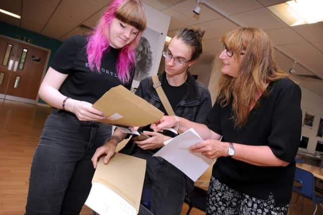 A Levels at Rye Studio School.
Lucie Eckersley and David Hicks with drama teacher Sarah Wall. SUS-160818-113055001