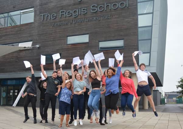 Students jumping for joy and their results