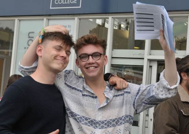 161079-01 havant college A levels
Jack Gilyead (18) and Harry Lown (18) celebrate with A and A* passes.
Pic Mick Young
18/08/2016 PPP-160818-113743006