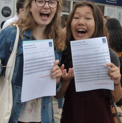161079-04 havant college A levels
Beth Punnett (18) and Kitty Chan (18) celebrate with A and A*' results.
Pic Mick Young
18/08/2016 PPP-160818-113816006