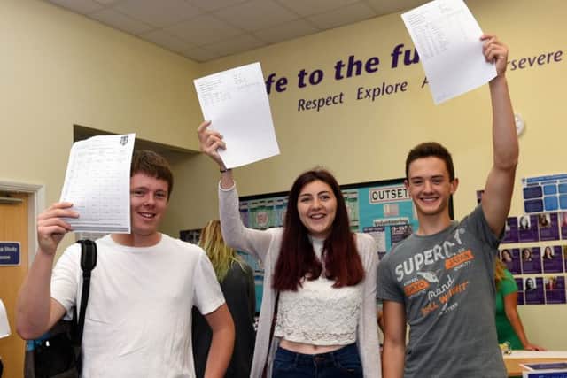 Students celebrate their exam results at Littlehampton Academy. Picture : Liz Pearce