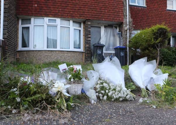 Floral tributes left in Osmonde Close, Worthing, where David Bond's body was found