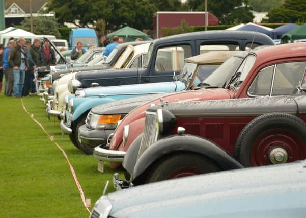 Bexhill Classic Car Show 2015 organised by the Bexhill 100 Motoring Club and held at The Polgrove on August 31st 2015. SUS-150109-073249001