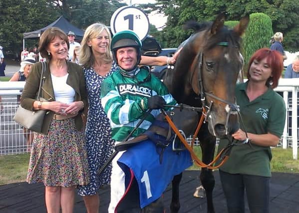 Richard Johnson and connections of Pied Du Roi celebrate his third win at Fontwell's Ladies' Evening