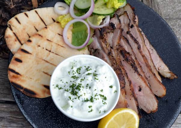 Spicy barbecued shoulder of lamb with tzatziki