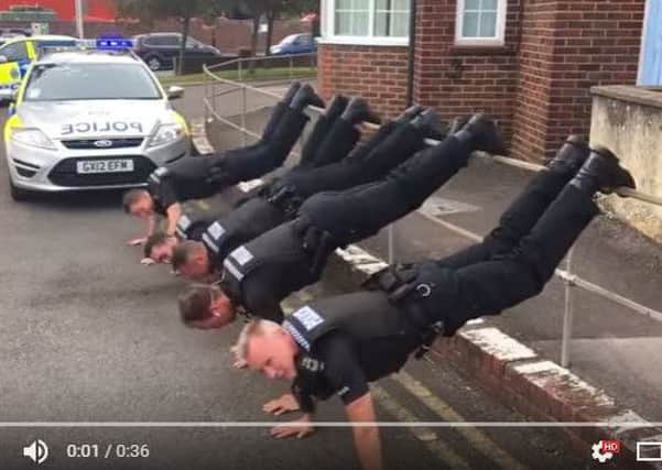 Officers taking the challenge outside Chichester Police Station