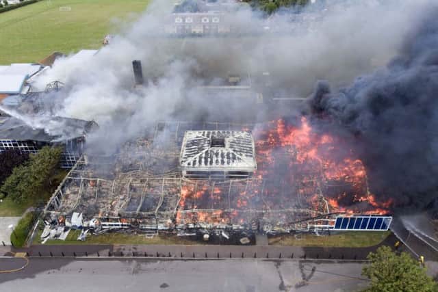 The fire service said more than 75 per cent of the school building was engulfed by flames. Picture by Eddie Mitchell