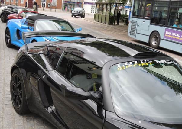 Lotus cars in the Carfax, Horsham SUS-160821-133529001