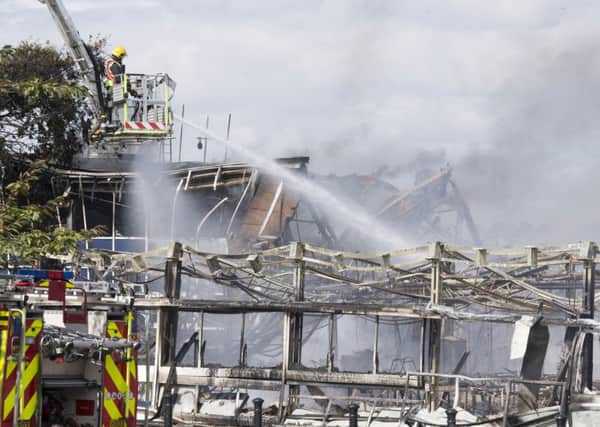 More than 100 firefighters tackled the blaze. Picture by Eddie Mitchell