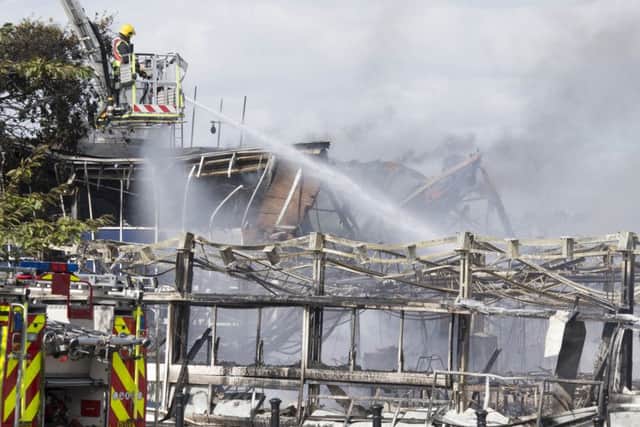 The remains of the school building following the fire. Picture by Eddie Mitchell
