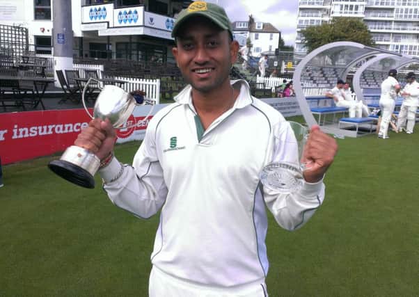 Three Bridges 2nds captain Sohail Shah lifts the Sussex Gray-Nicolls T20 Cup SUS-160821-231436002