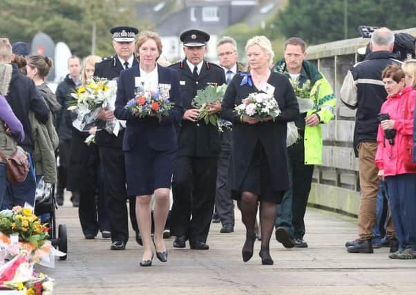Police paying tribute at the Shoreham Toll Bridge last year. Picture: Eddie Mitchell