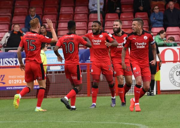 Crawley Town players celebrate Joe McNerney's equaliser during their 1-1 draw with Barnet. Picture by Phil Westlake SUS-160820-235453002