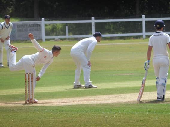 Jed O'Brien bowling for Hastings Priory against East Grinstead at Horntye Park on Saturday. Picture by Justin Lycett
