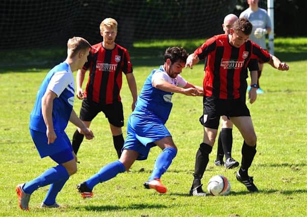 Action from Southwick's pre-season friendly with Shoreham. Picture: Stephen Goodger