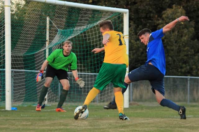 Action from Tuesdays game. Picture: Chris Hatton
