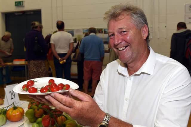 Geoff Ford with his prize winning cherry plum tomatoes
