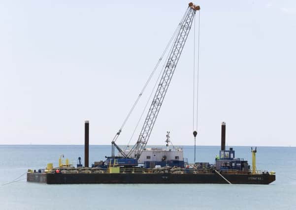 A barge seen off the Worthing coast as the Rampion Wind Farm project continues. Picture: Eddie Mitchell