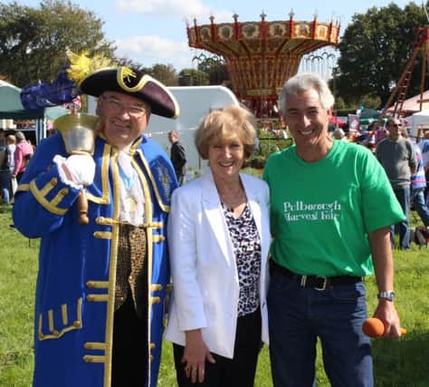 Last year's fair opening: Bob the town cryer, Chairman Malcolm Grey and Pat Arculus Chairmen of WSCC