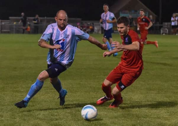 Action from Worthing United's match at Hassocks last night. Picture by Phil Westlake