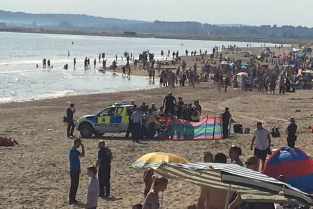 Police on Camber Sands beach. Photo by @Tashka4 on Twitter SUS-160824-172822001
