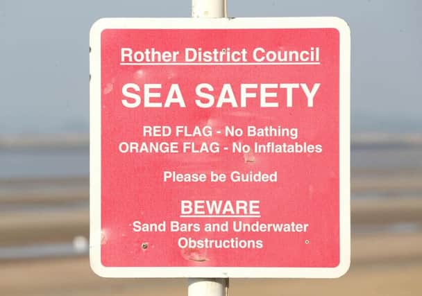 Safety sign at Camber Sands. Photo by Eddie Mitchell.
