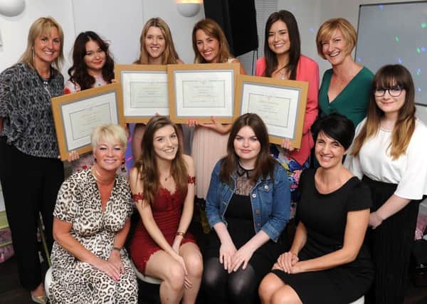 Tutors and students at the Sussex Beauty Training School 2016 Awards SUS-160825-145735001