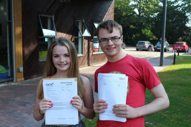 Claremont's Alexandra McKenzieÂ­-Sanchez and Thomas Dixon with their outstanding GCSE results. Photo by Claremont SUS-160825-112137001