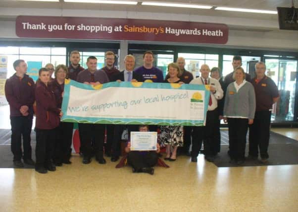 Sainsburys members of staff showing their support for the charity SUS-160825-161027001