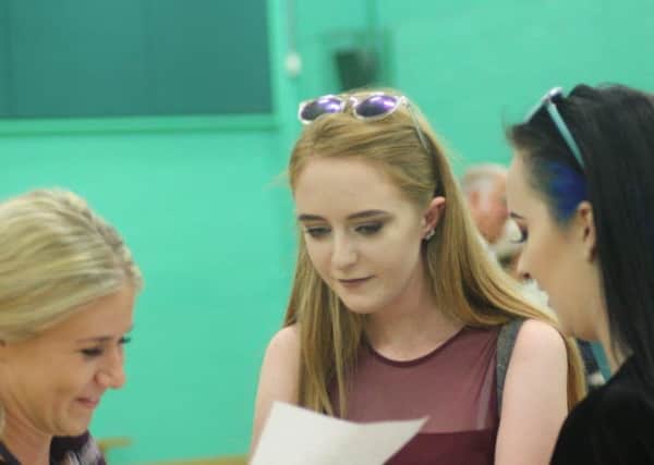 Students at Sir Robert Woodard Academy picking up their GCSE results