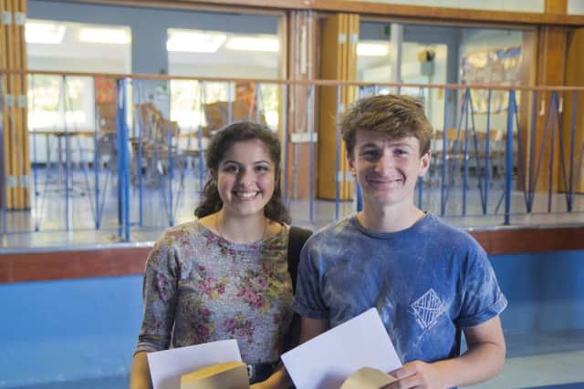 St Richard's Catholic College students pick up their GCSE results SUS-160825-125601001