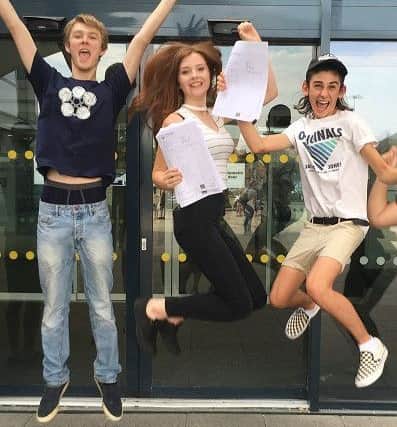 Jumping for joy are Connor Shergold, Yazmine Lane and Will Hodges