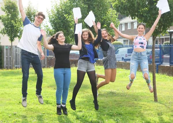 DM16137476a.jpg GCSE results, Selsey Academy. L to R Gabriel Clark, Angela Kirazyan, Ellie Galloway, Keely Samain and Lily Collins. Photo by Derek Martin SUS-160825-130712008