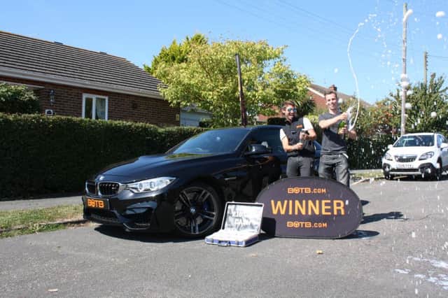 Bexhill man David Golding won a ?60,000 BMW M4 and ?10,000 cash with dreamcar competitions company BOTB.
David is pictured with BOTBs Christian Williams. SUS-160831-160236001