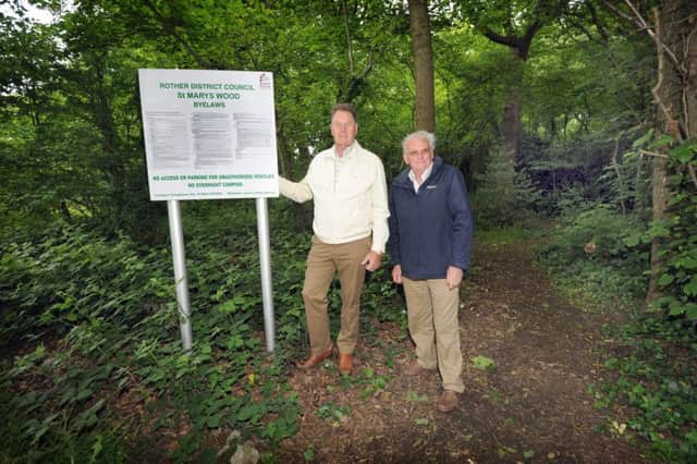 Christopher Wallace (Chairman - Ellerslie Area Residence Association) and Chris Ashford (Secretary) at the entrance to St Mary's Wood, Bexhill. SUS-160206-101002001