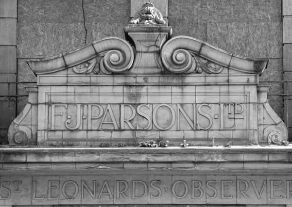 FJ Parsons sign at Hastings Observer building SUS-160830-095544001