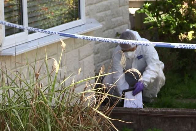 The scene of the suspected murder at a property in Chrisdory Road, Mile Oak. Picture: Eddie Mitchell