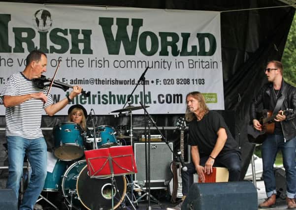 DM158907a.jpg Crawley Irish Festival 2015. Strawdogs. Photo by Derek Martin SUS-150830-194130008