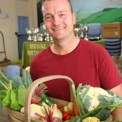 Nigel Dunne and his first prize winning trug of vegetables DM16138095a