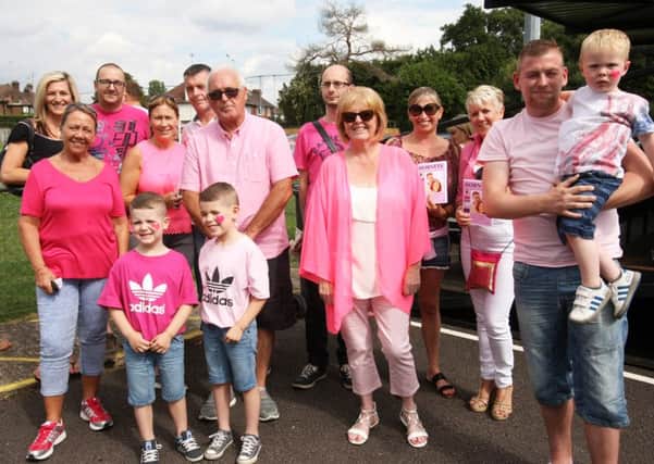 DM16139174a.jpg St Catherine's Hospice fundraiser at Horsham v Lewes football match. Supporters in pink. Photo by Derek Martin SUS-160829-221020008