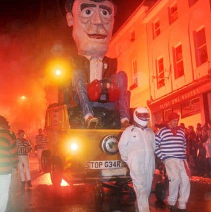 An effigy of Jeremy Clarkson is pulled through the streets at the Lewes Bonfire 2015 celebrations this evening
Photograph taken by Simon Dack