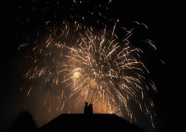 Fireworks light the night sky at the Lewes Bonfire 2015 celebrations this evening
Photograph taken by Simon Dack