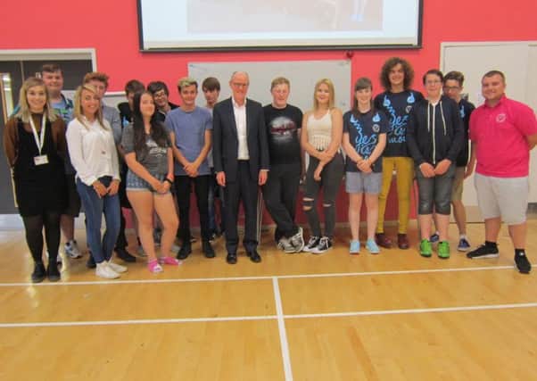 Nick Gibb with the team of young people